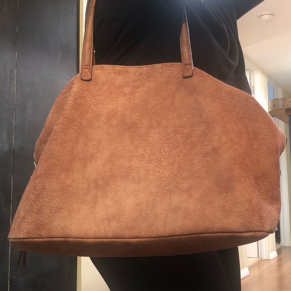 Free People travel bag with matching wristlet